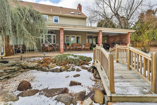 view of snow covered deck