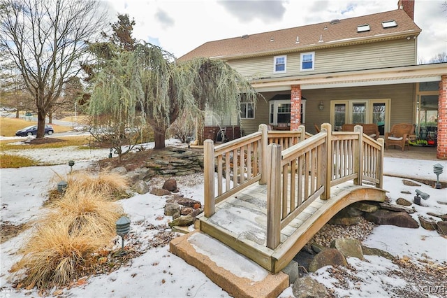 view of snow covered deck