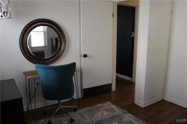 office featuring dark wood finished floors and baseboards