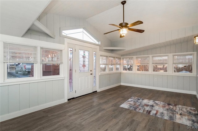 entrance foyer featuring baseboards, a ceiling fan, vaulted ceiling, and dark wood-style flooring