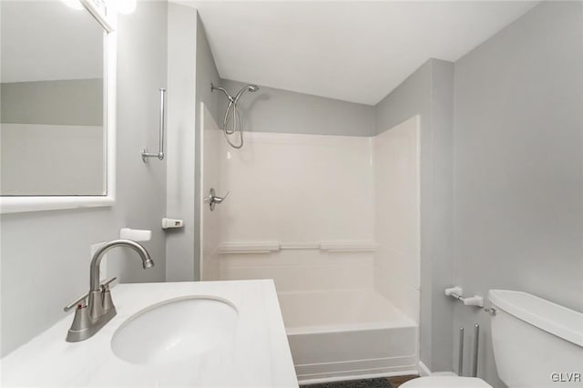 full bathroom featuring a sink, toilet, and shower / bathtub combination