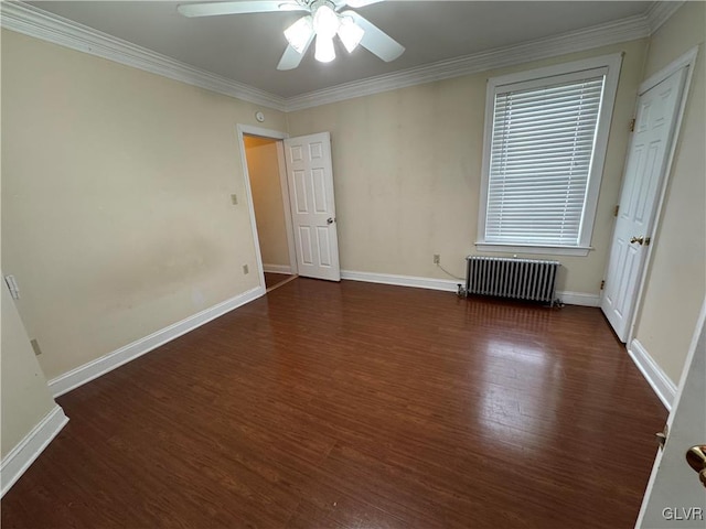 unfurnished bedroom featuring baseboards, radiator, wood finished floors, and crown molding