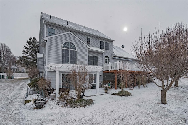 view of snow covered property