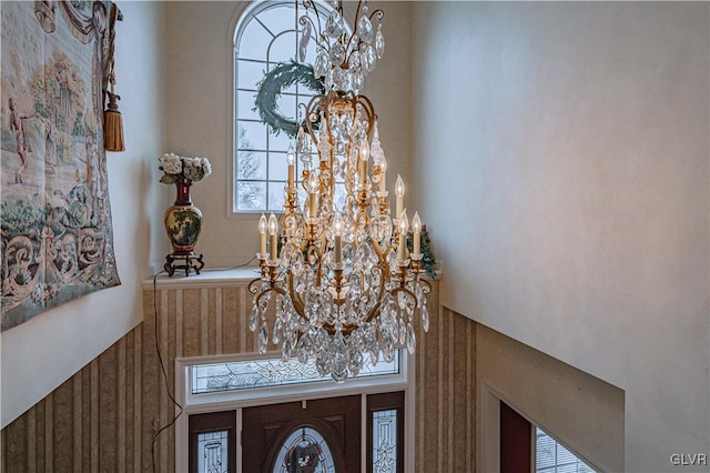 details with an inviting chandelier