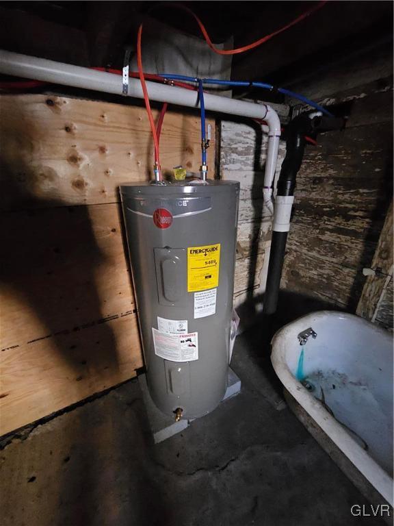 utility room with electric water heater