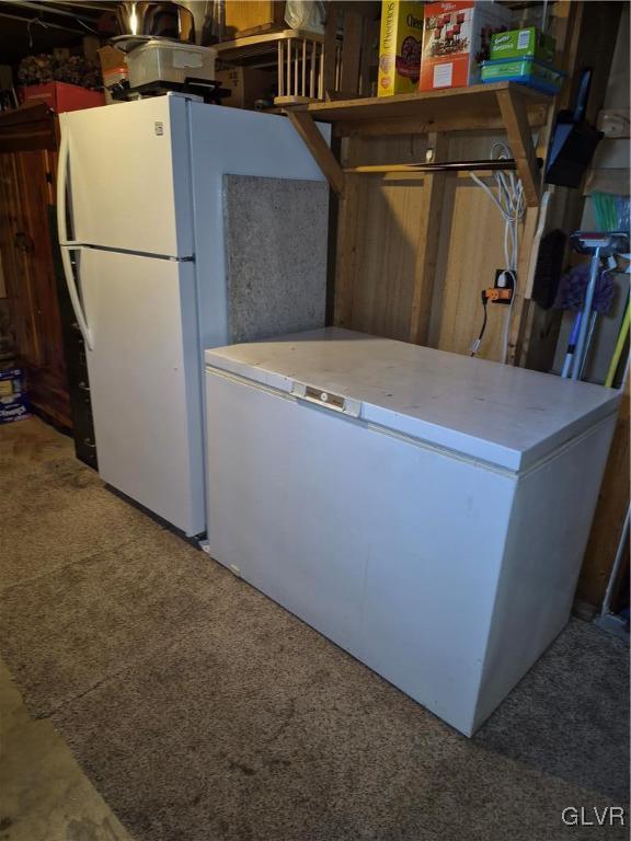 kitchen featuring freestanding refrigerator and refrigerator