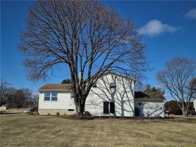 view of property exterior with a yard