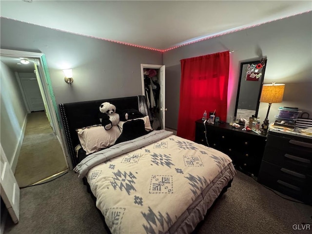 bedroom featuring carpet flooring and baseboards