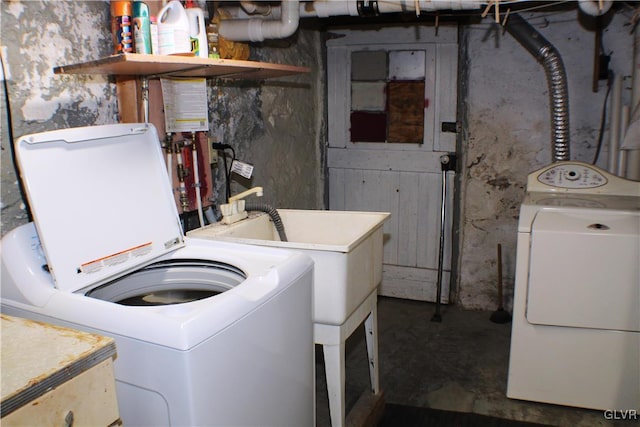 washroom with laundry area and separate washer and dryer