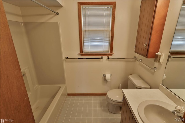 full bathroom with toilet, baseboards, shower / washtub combination, and vanity