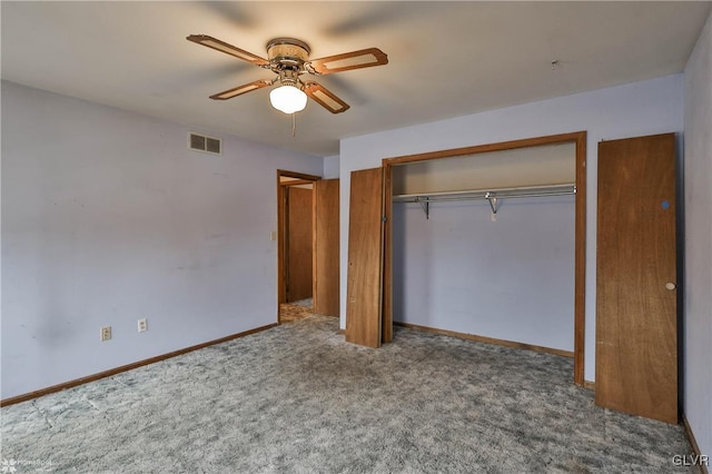 unfurnished bedroom with carpet floors, a ceiling fan, visible vents, baseboards, and a closet