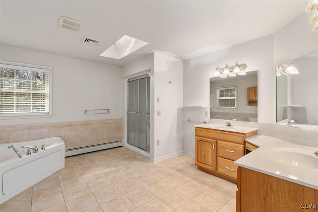 full bath with a skylight, visible vents, baseboard heating, a sink, and tile patterned flooring