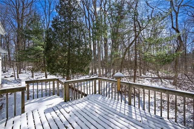 view of snow covered deck