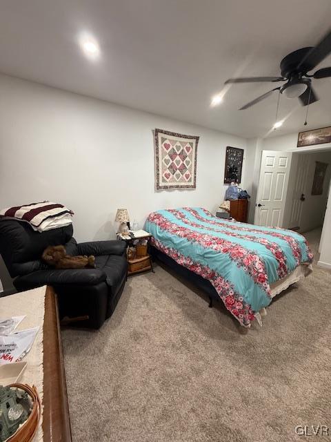 carpeted bedroom with ceiling fan