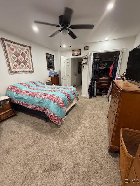 bedroom featuring light carpet, a ceiling fan, and recessed lighting