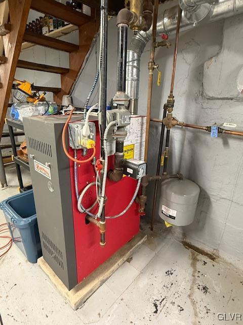 utility room featuring a heating unit