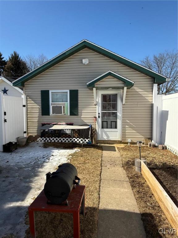 view of front of house with fence