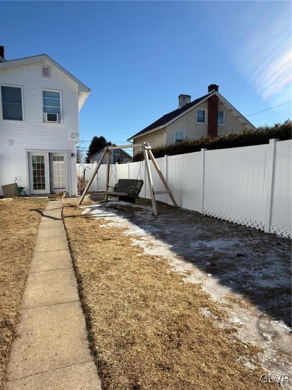 view of yard with a fenced backyard