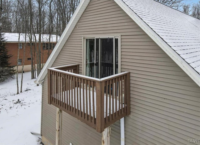 view of snow covered deck