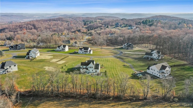 bird's eye view featuring a rural view and a mountain view