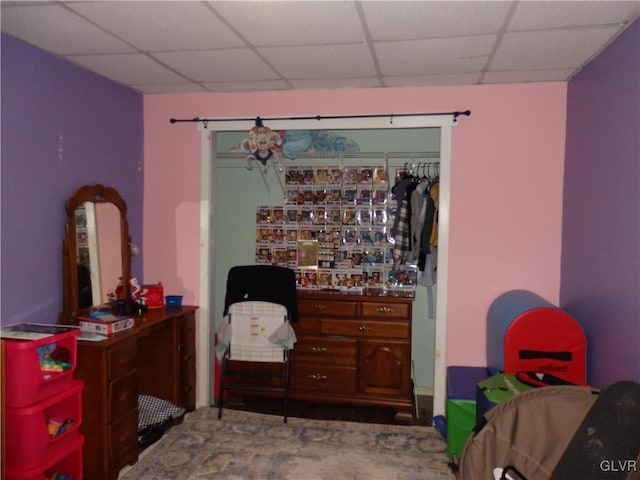 bedroom featuring a drop ceiling