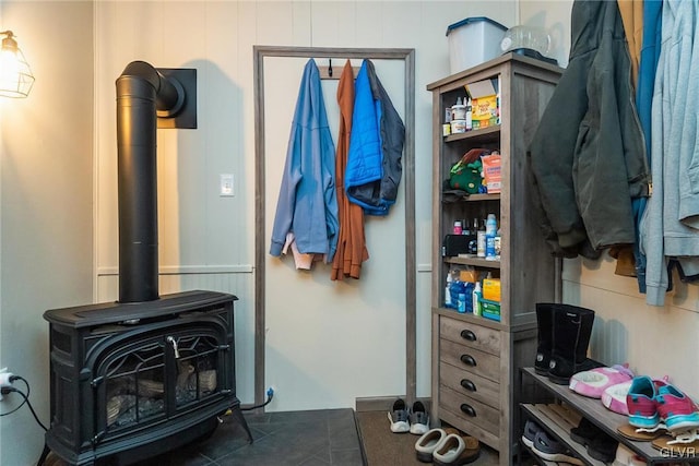 interior space featuring a wood stove