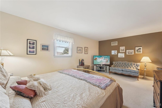 bedroom featuring carpet floors and visible vents