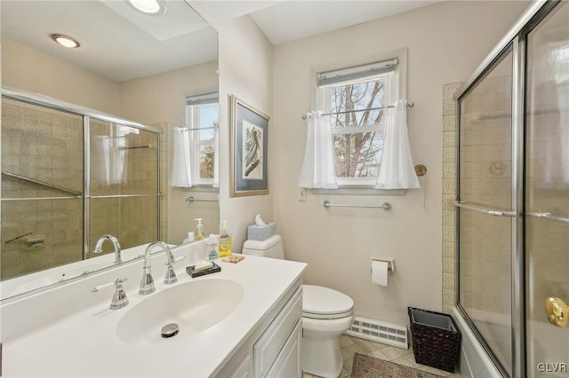 full bath featuring visible vents, toilet, a shower with shower door, vanity, and tile patterned floors