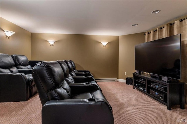 home theater featuring light colored carpet, baseboards, and a baseboard radiator