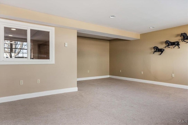 empty room with recessed lighting, carpet, and baseboards