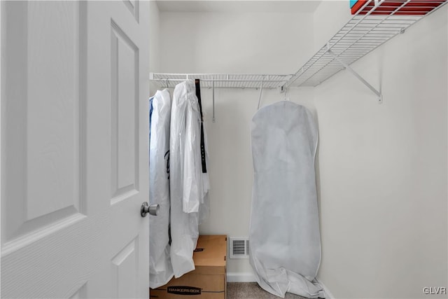 walk in closet featuring visible vents