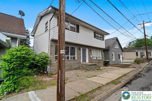 63 N 10th St, Stroudsburg, PA 18360 - view of front of home featuring stone siding