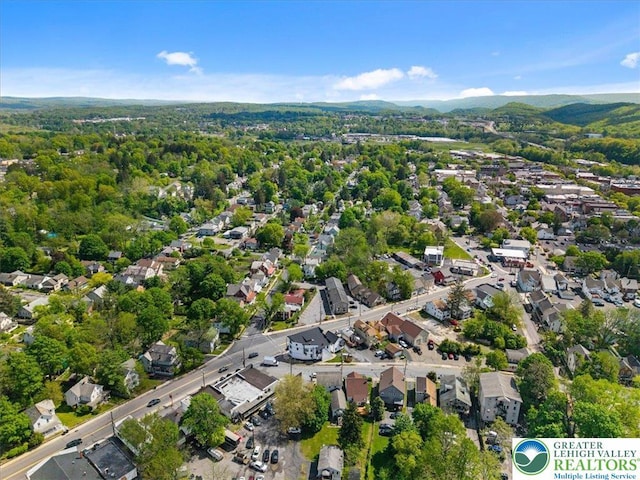 63 N 10th St, Stroudsburg, PA 18360 - aerial view of residential area with a mountain backdrop