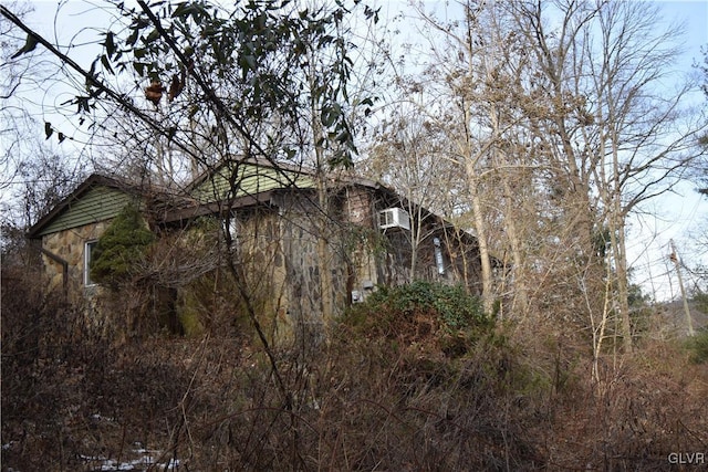 view of property exterior featuring stone siding