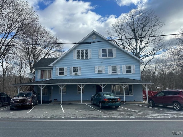 view of front of house featuring uncovered parking