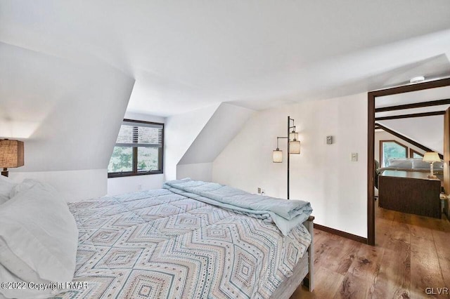 134 Moseywood Rd, Kidder Township S, PA 18624 - bedroom with baseboards, wood finished floors, and vaulted ceiling