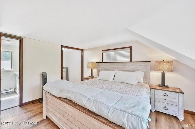 134 Moseywood Rd, Kidder Township S, PA 18624 - bedroom with baseboards, light wood-style flooring, and baseboard heating