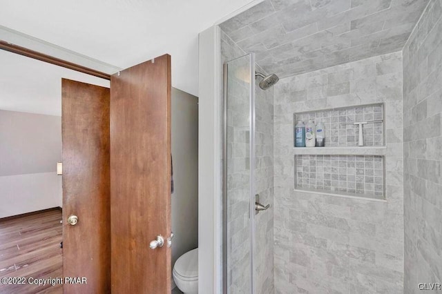134 Moseywood Rd, Kidder Township S, PA 18624 - bathroom with a shower stall, wood finished floors, and toilet
