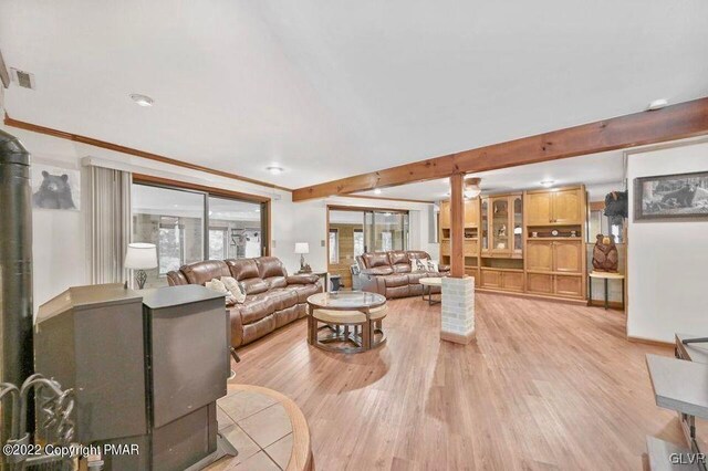 134 Moseywood Rd, Kidder Township S, PA 18624 - living area with crown molding, visible vents, light wood-style floors, and beamed ceiling