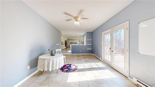 doorway to outside featuring a ceiling fan, french doors, baseboards, and baseboard heating