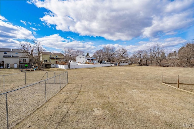 view of yard featuring fence