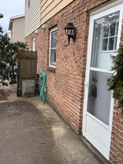 view of home's exterior featuring brick siding