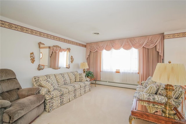 carpeted living room with plenty of natural light, a baseboard radiator, and visible vents