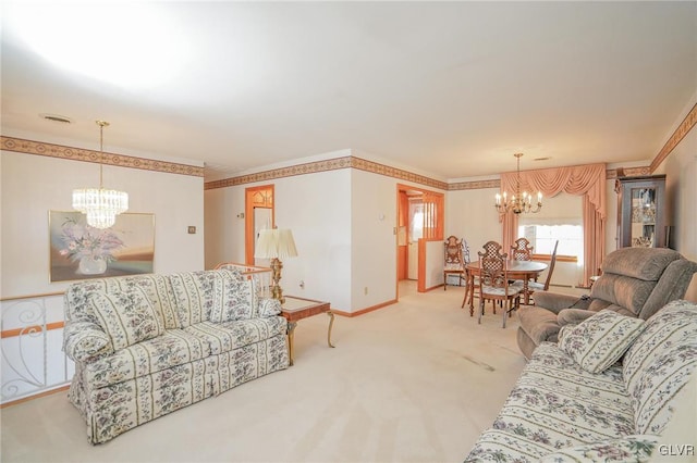 living area featuring crown molding, baseboards, light colored carpet, and a notable chandelier