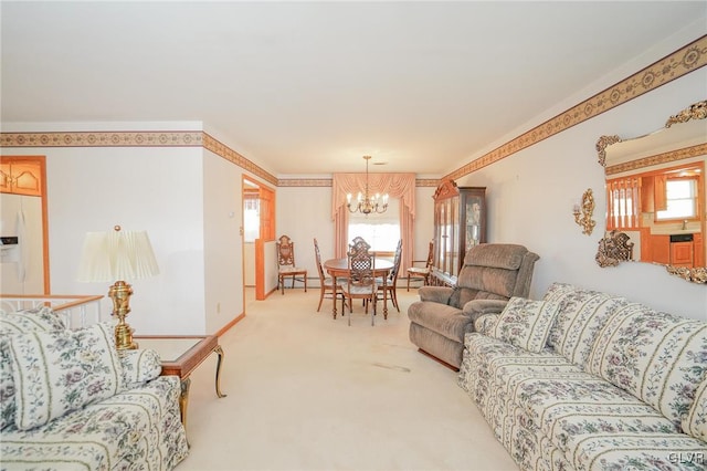 living room featuring a chandelier, ornamental molding, and light carpet