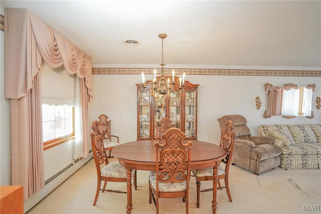 dining area with light carpet, baseboard heating, visible vents, and a chandelier