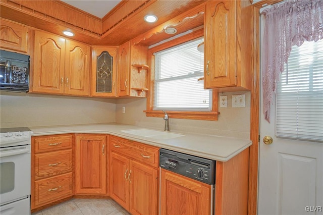 kitchen with white range with electric cooktop, dishwasher, light countertops, black microwave, and a sink