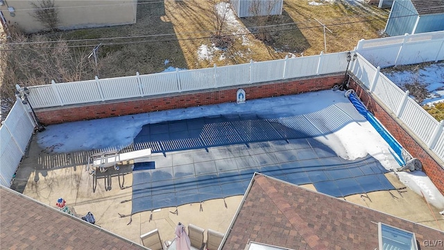 view of pool featuring a patio area and a fenced backyard