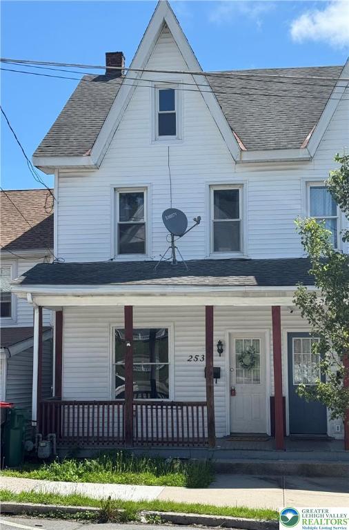 253 N 2nd, Lehighton Boro, PA 18235 - view of front of property with a porch, a chimney, and roof with shingles