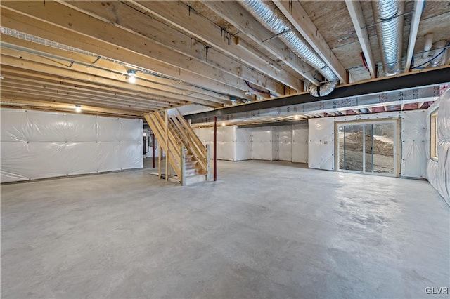 basement featuring stairs